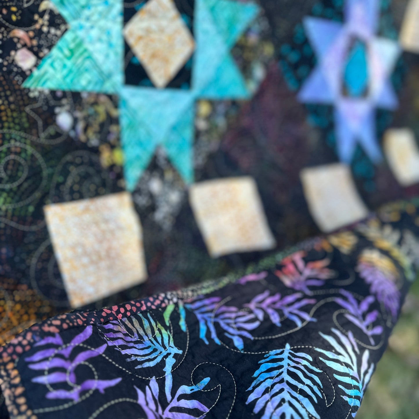 L Whiting, Sawtooth Galaxy Throw Quilt